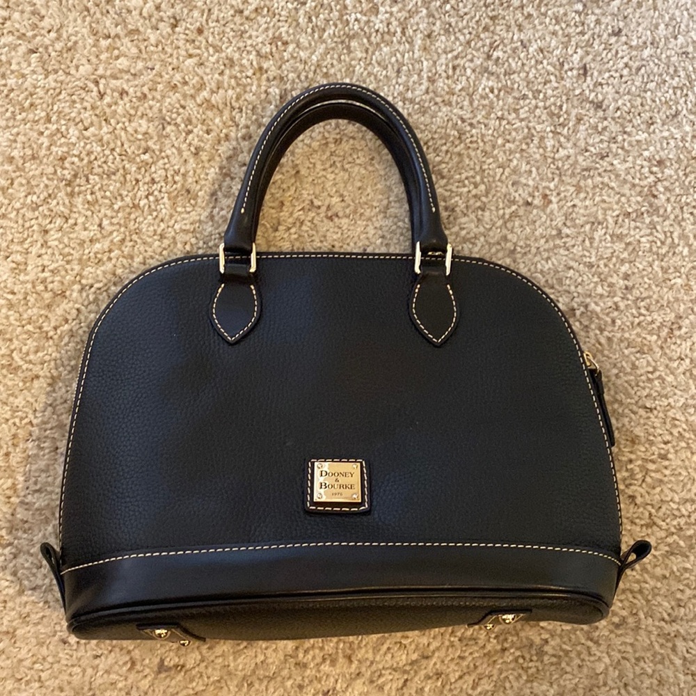 Black Dooney & Bourke handbag with additional crossbody strap and key chain.